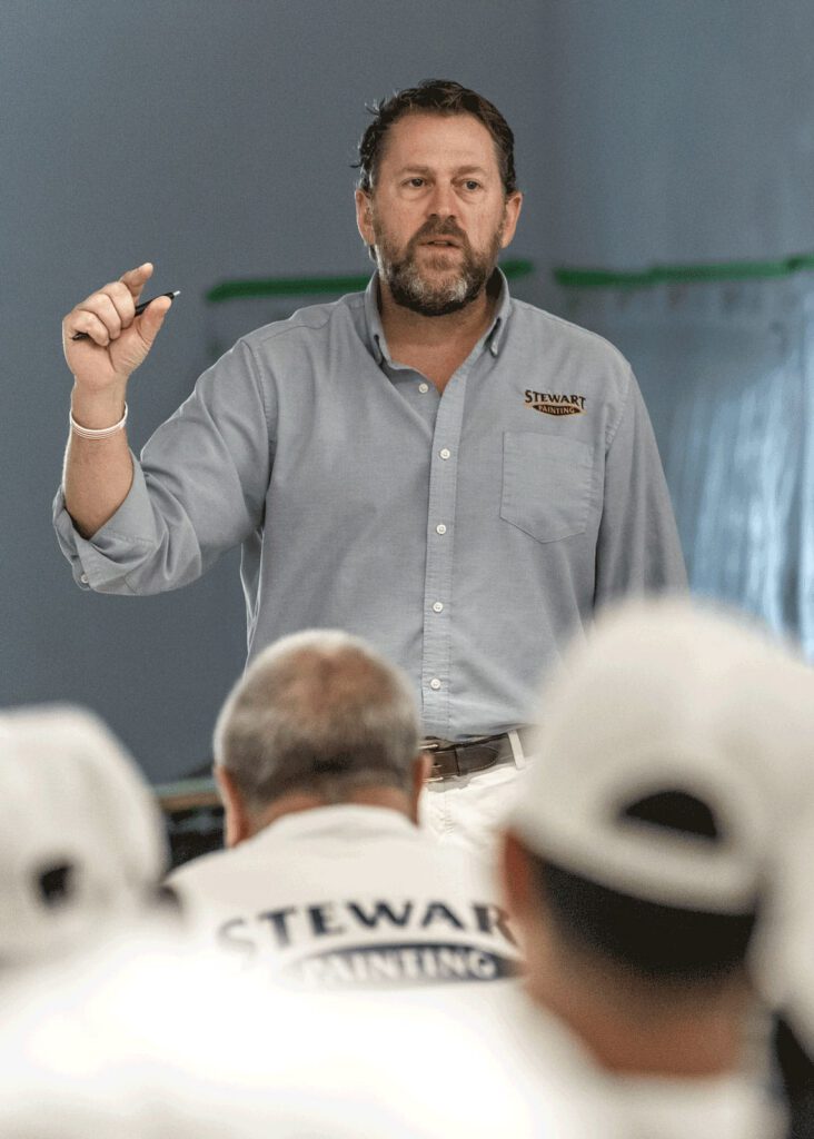 Todd speaking at employee training.